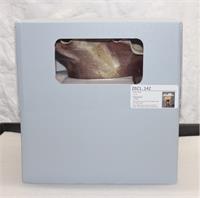 Image of a blue board box with a window that allows one to observe the top edge of the object stored within. 