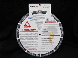 Image of cardboard wheel with text.