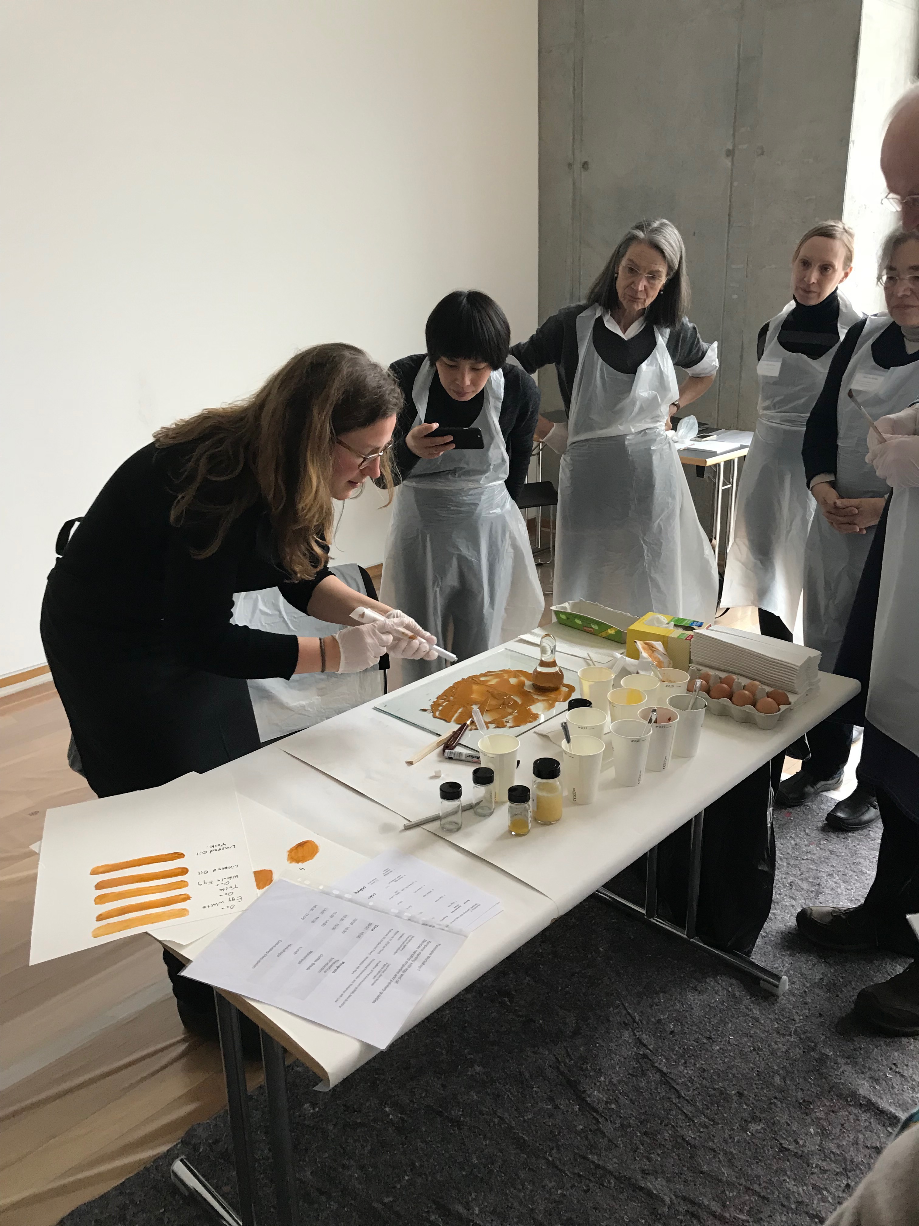 Conservators creating tempera paints