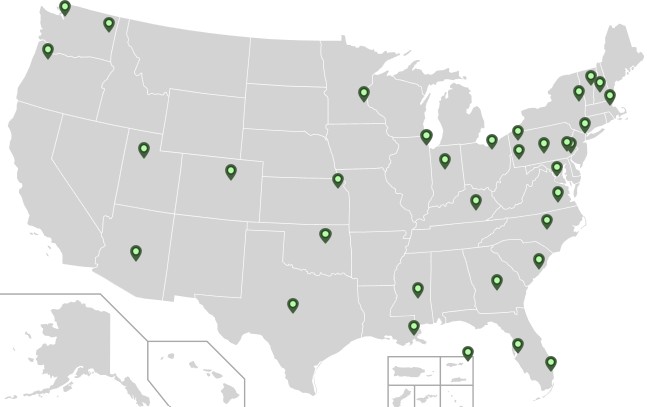 Map of the United States with green pins.