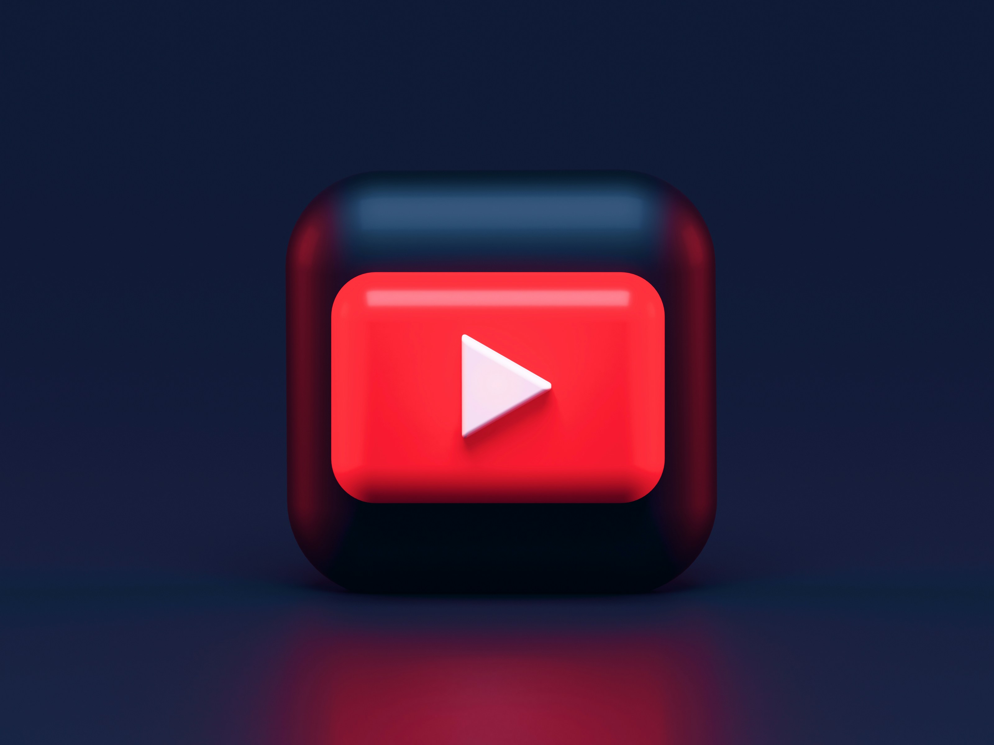 Image of red button with arrow
