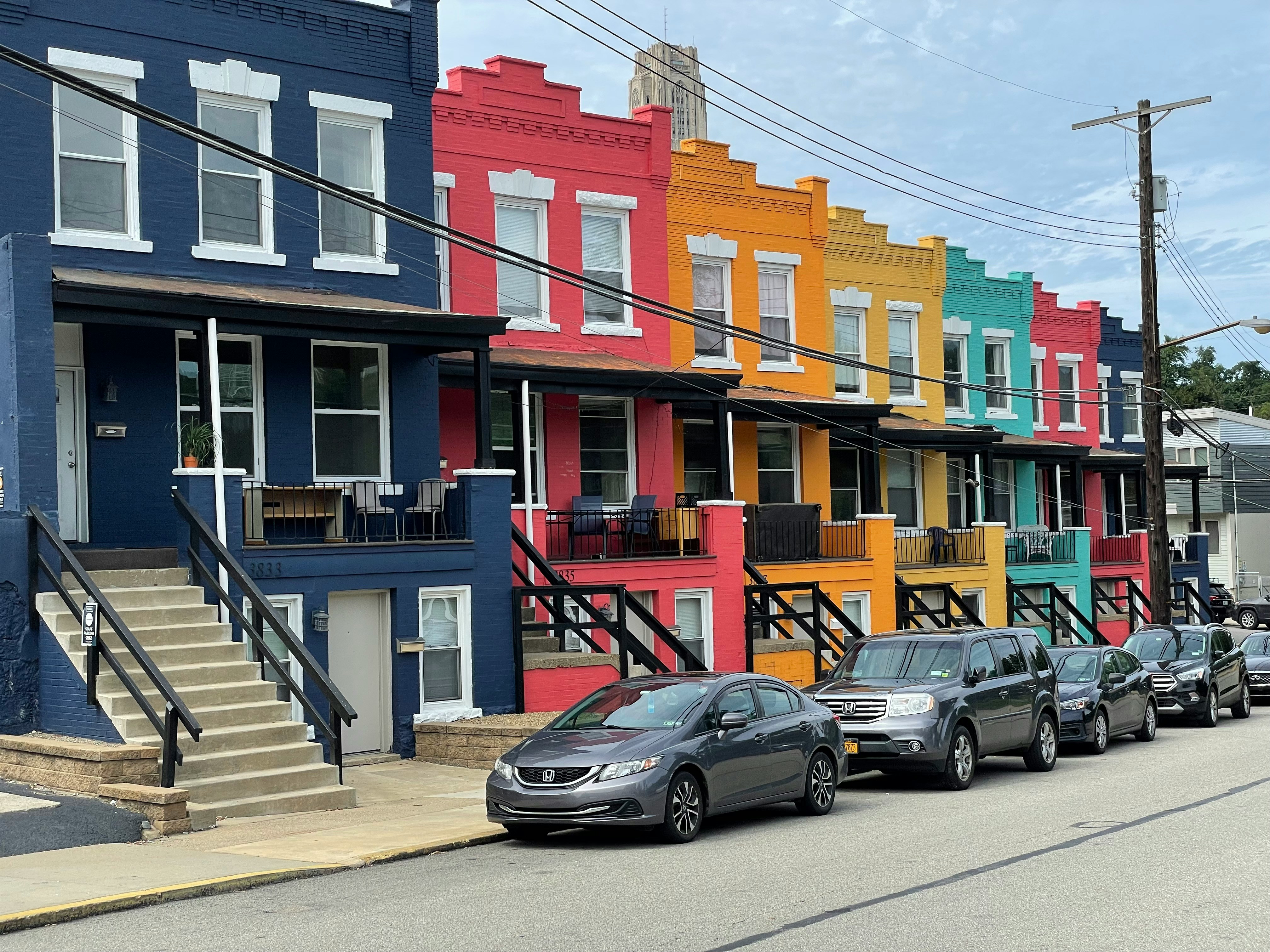 Row of colorful houses along street