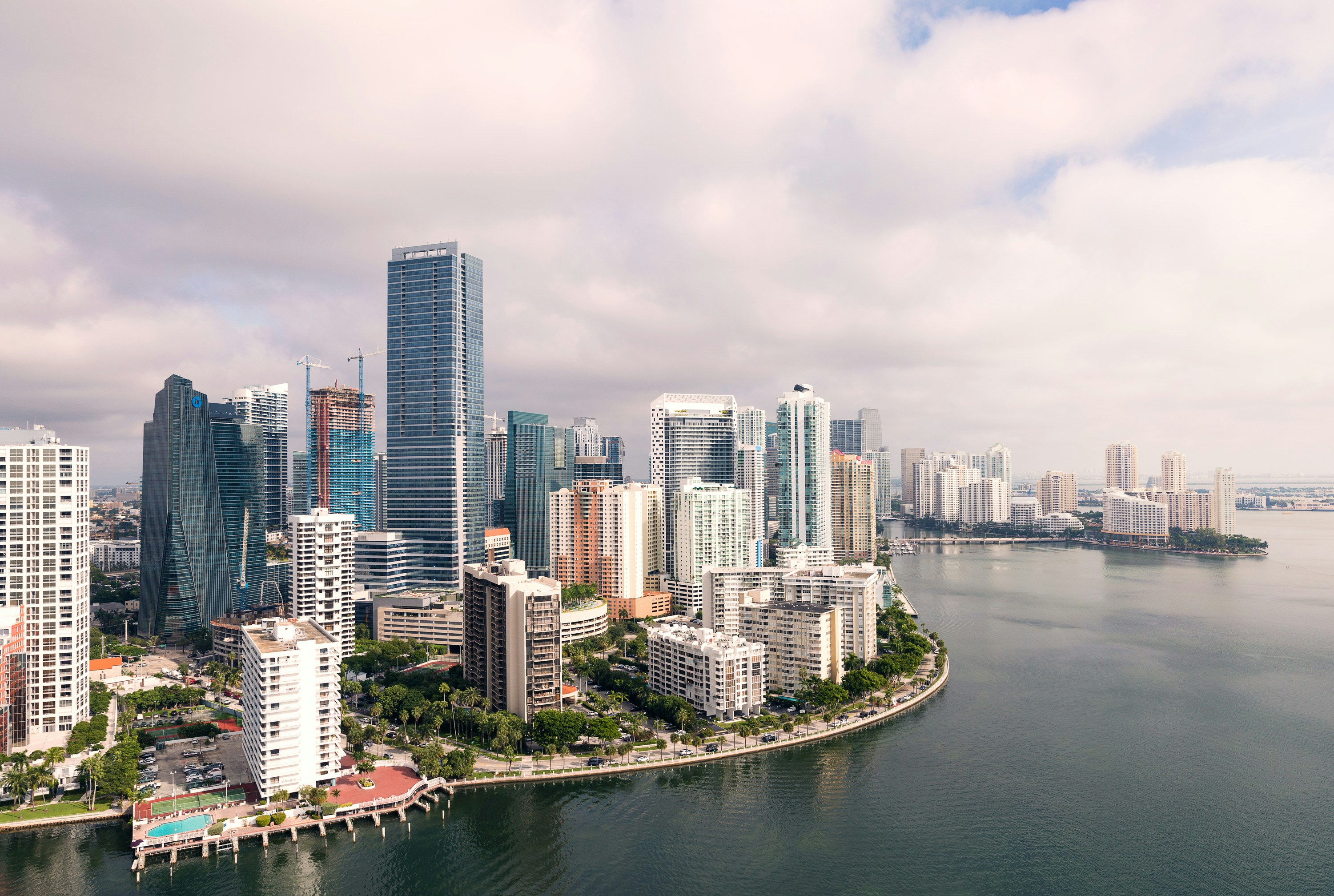 City buildings lining a coast with ocean