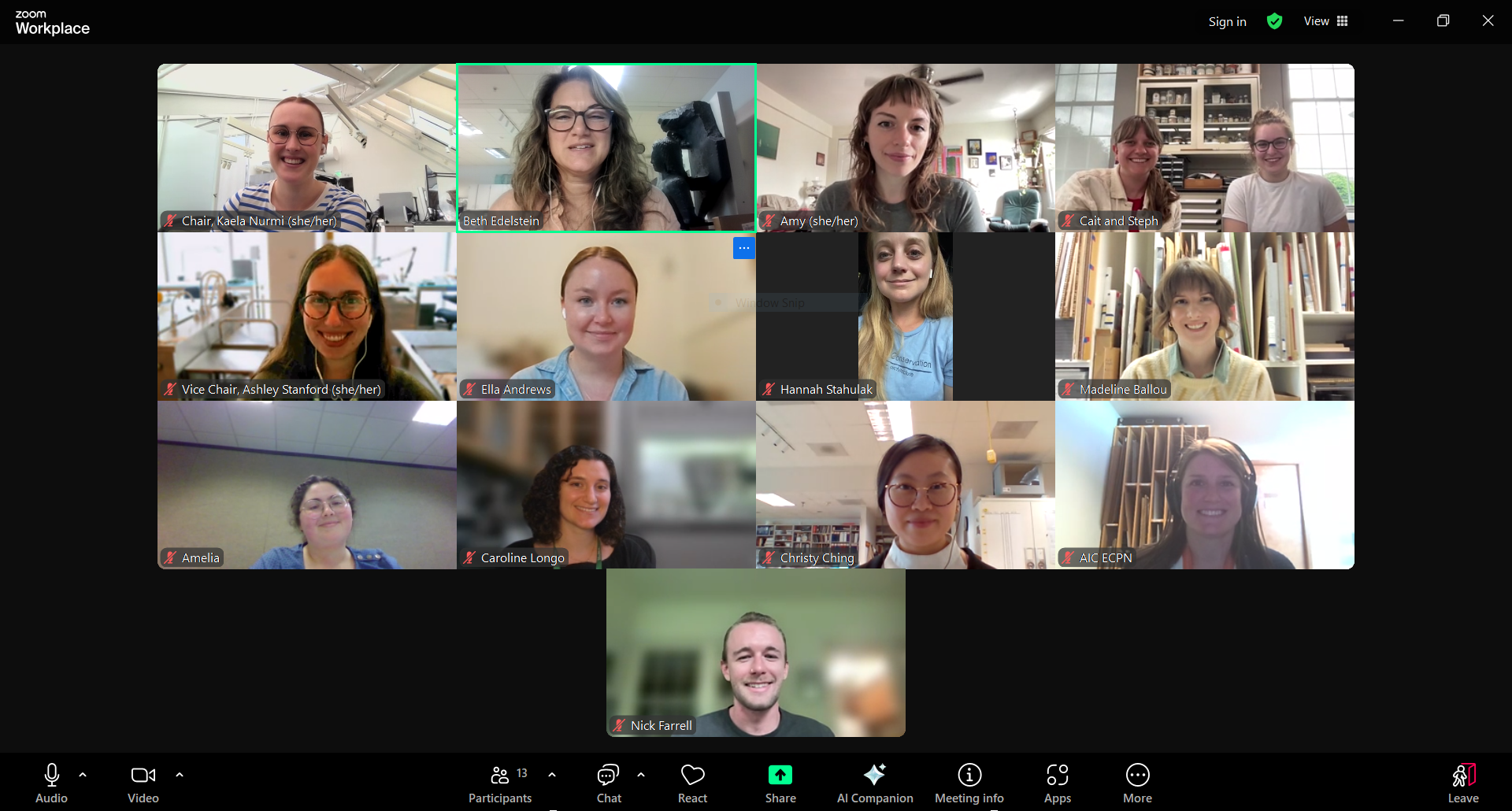Several rows of faces appear on a Zoom screen during an officer meeting