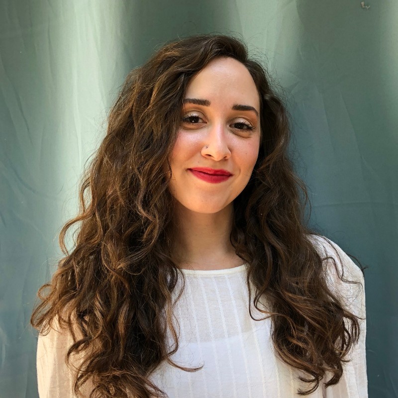 Photo of a woman with long brown hair