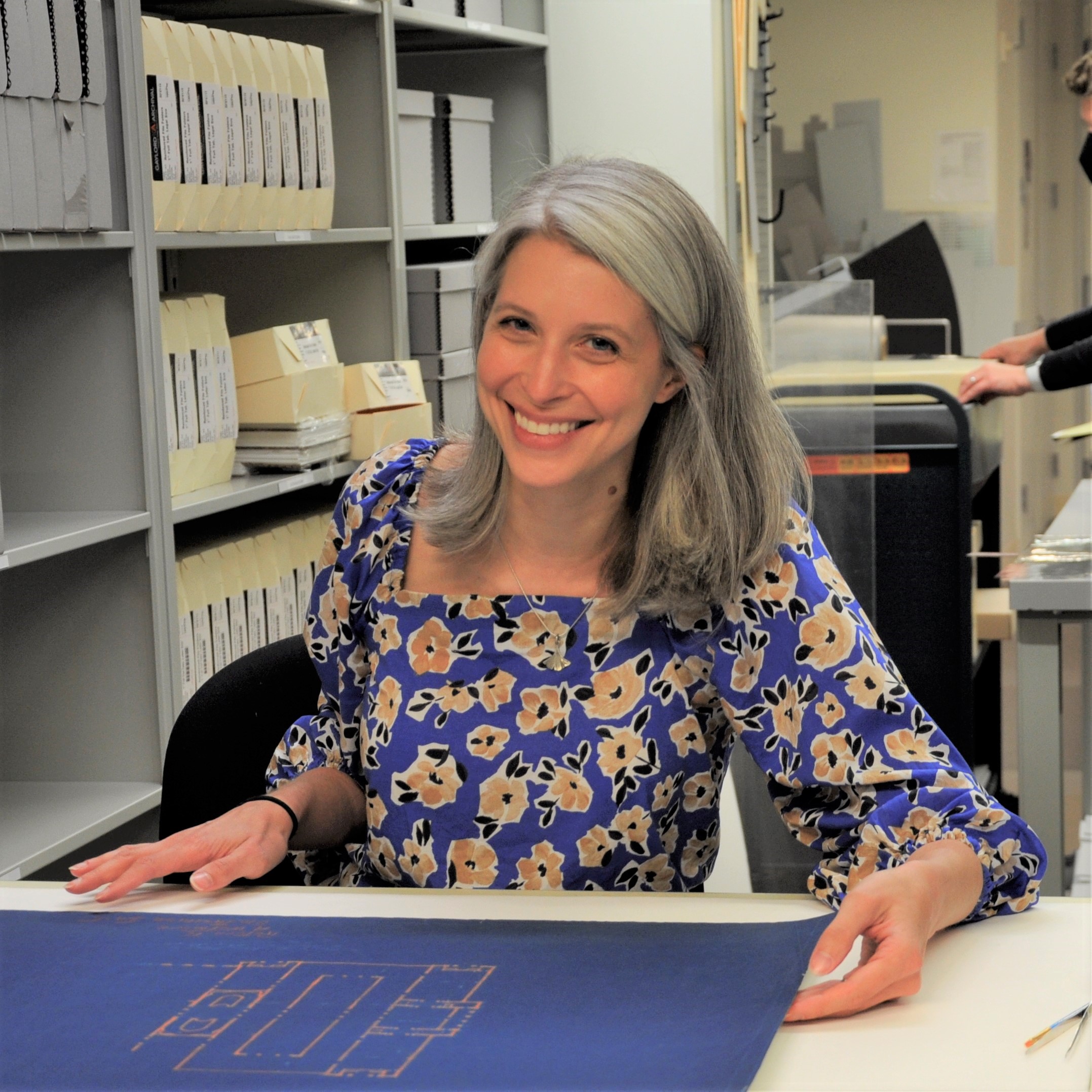 Photo of woman with medium-length gray hair