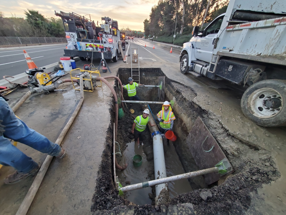 Image of a Olivenhain Municipal Water District workers repairing a water line.