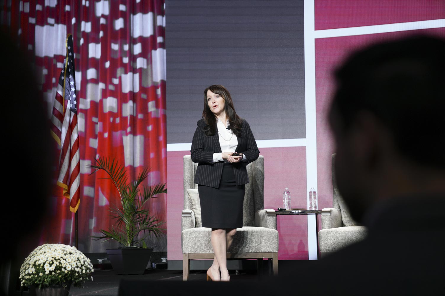 Marcie Frost Marcie Frost Chief Executive Officer of CalPERS presenting in front of crowd