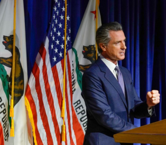 Gov Newsom at podium