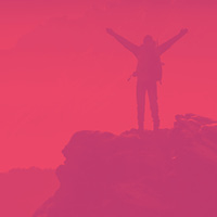 Graphic of a person on top of a mountain celebrating.