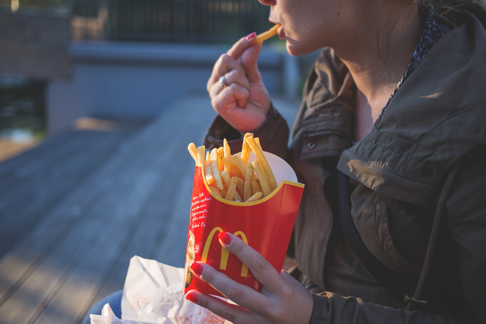 person eating McDonald's fries