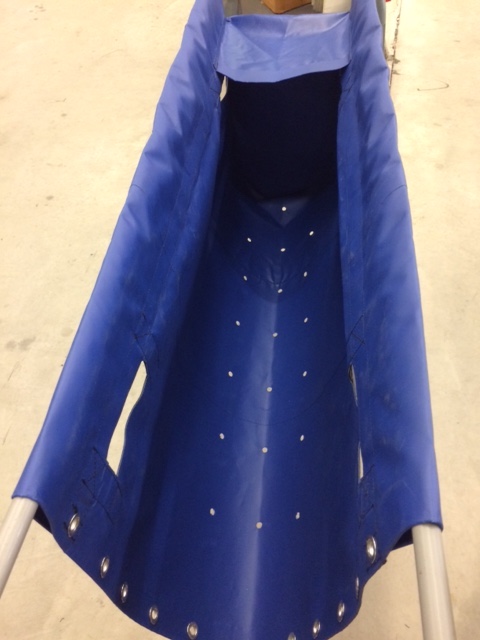 A tarp with perforations.