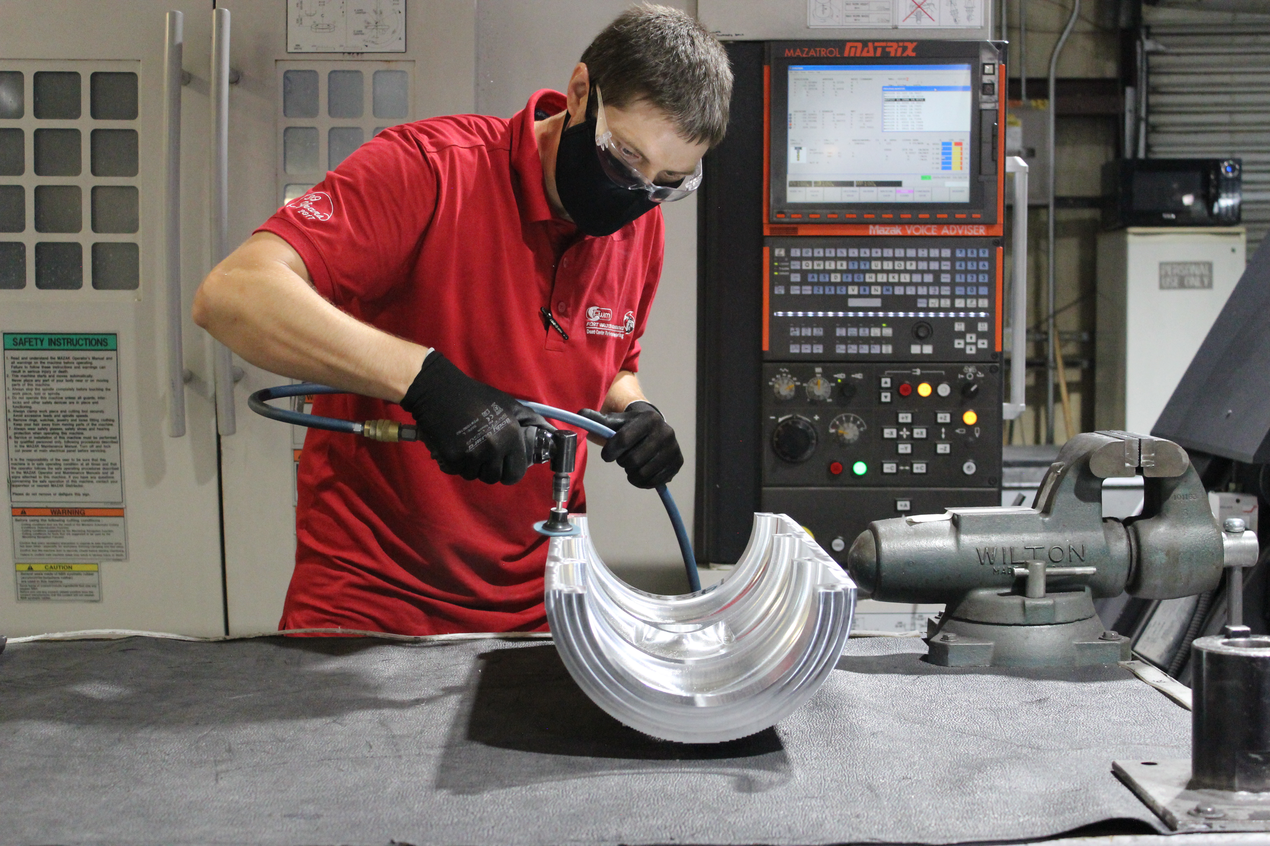 Man working on metal