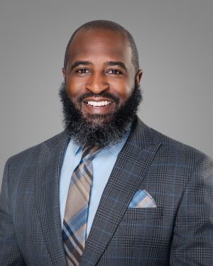 man dark hair - suit - dark skin