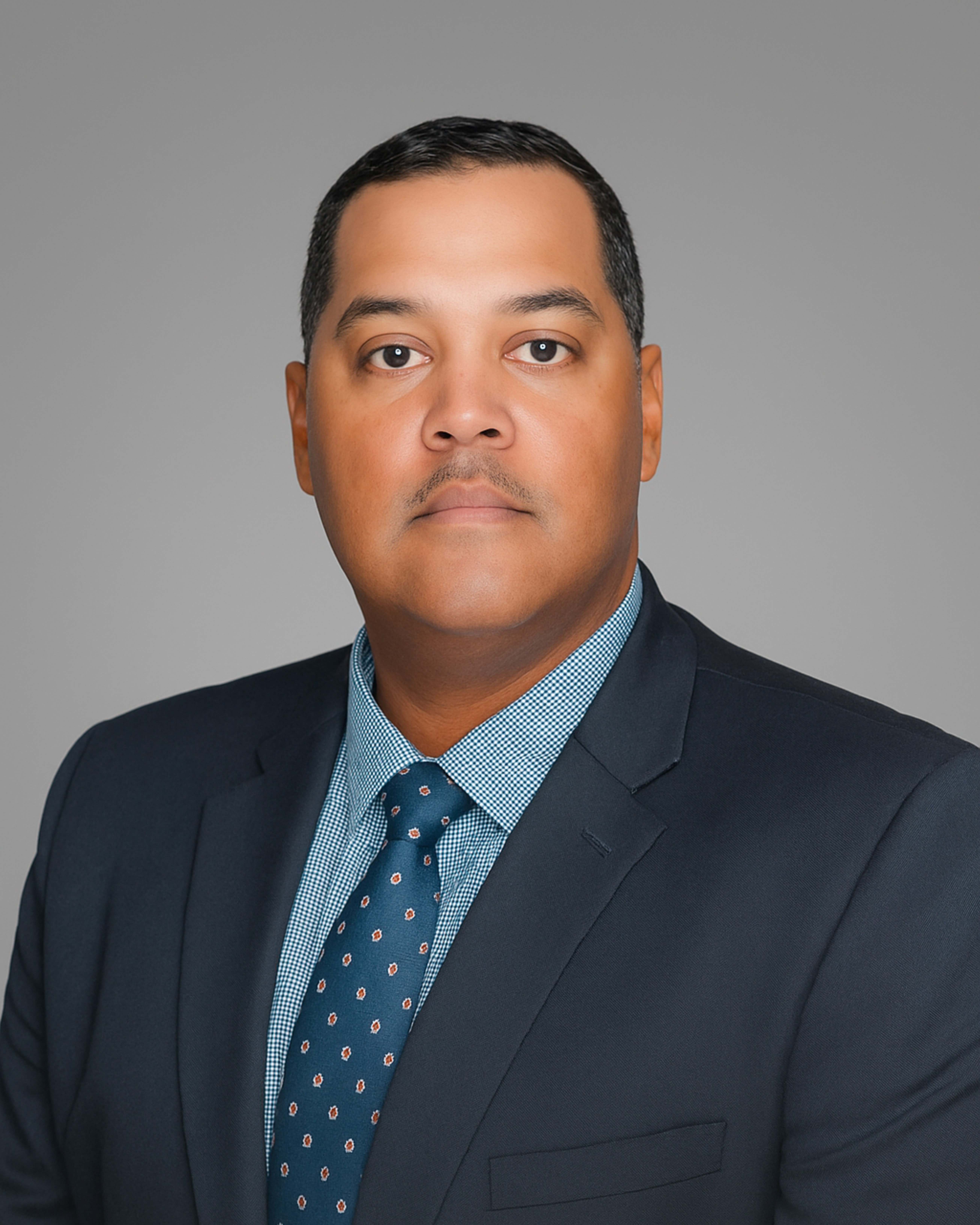 man black hair grey suit and tie - dark skin