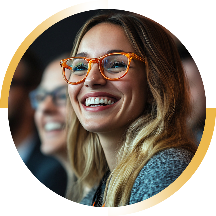 Woman at a Conference Smiling and Wearing Glasses