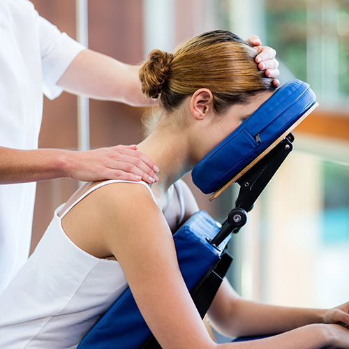 woman getting a chair massage