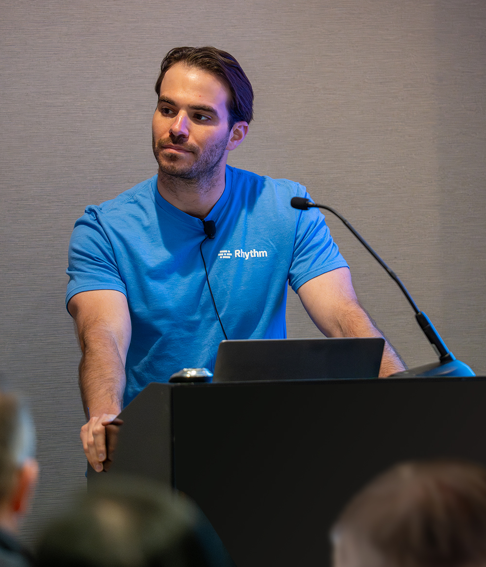Exhibitor presenter speaking to attendees at a past Super Forum session