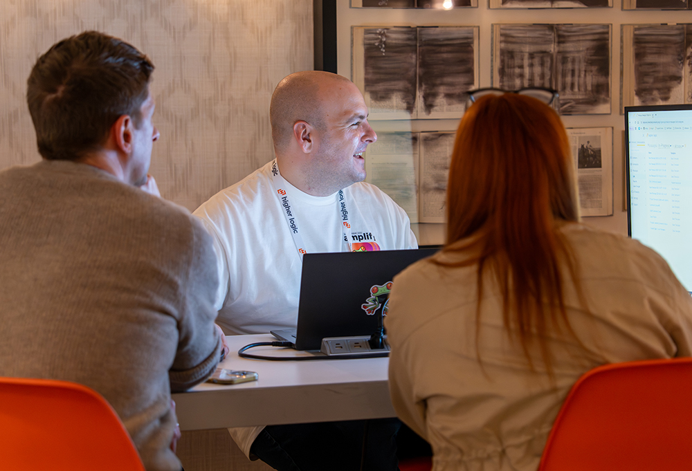 attendees working together at a Learning Lab session during a past Super Forum event