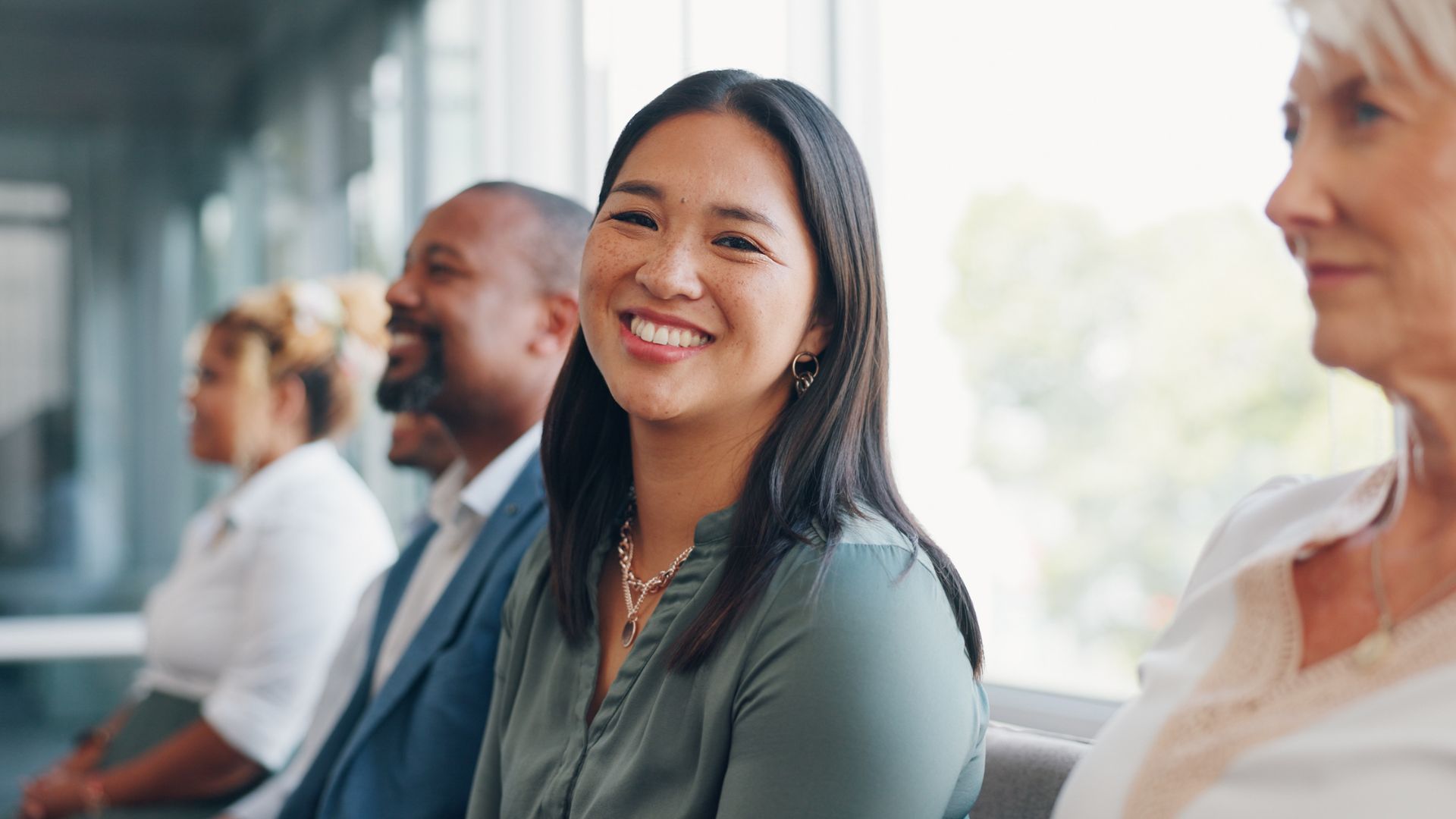Woman smiling at camera professionally