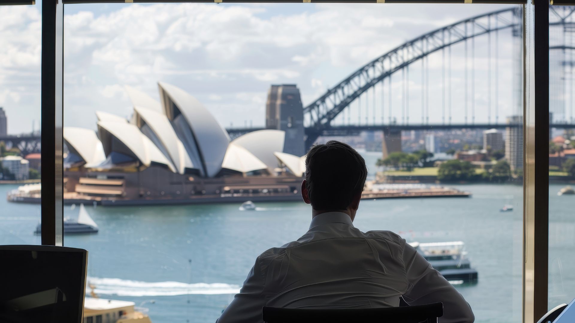 Office worker in front of harbour bridge