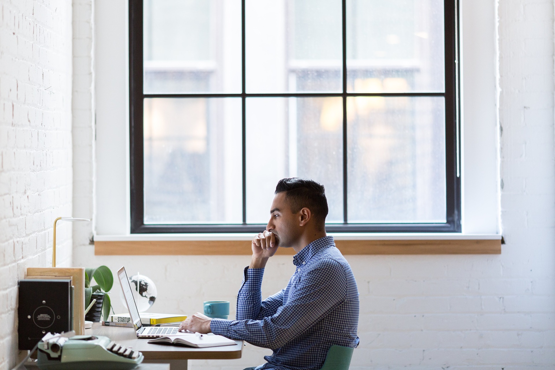 man using laptop