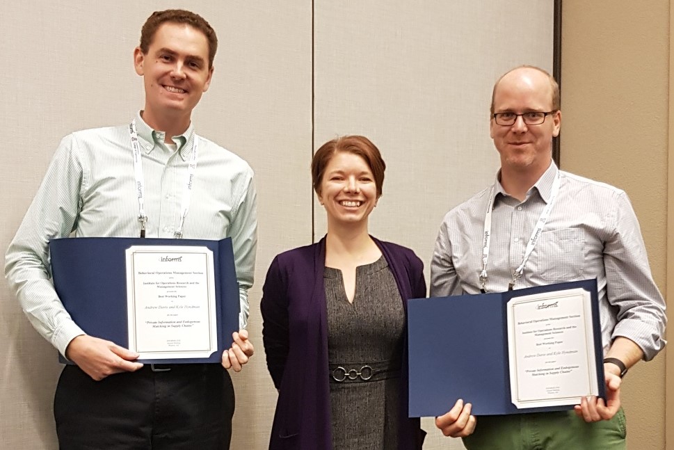 Andrew Davis, Julie Niederhoff, Kyle Hyndman accepting award