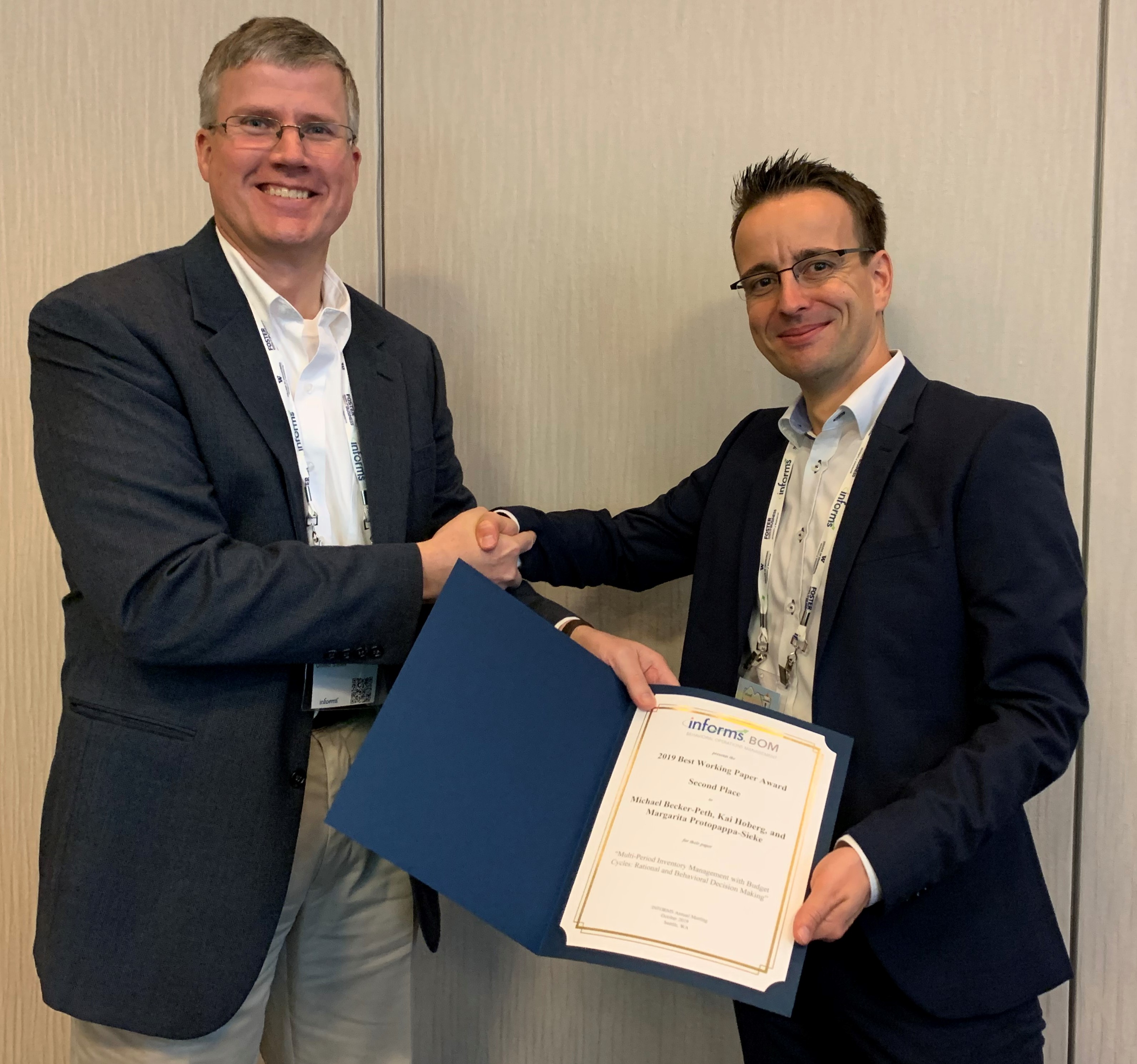 2019 Runner Up Brent Moritz presents award to runner-up presenter Michael Becker-Peth.