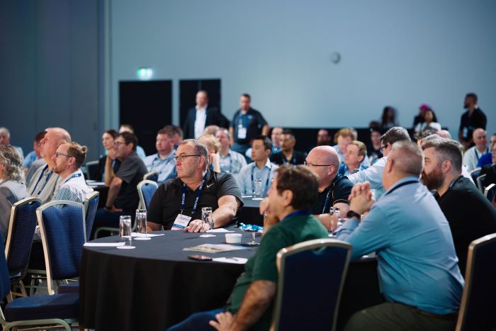 Delegates watching a presentation at fleet conference