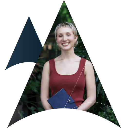 An arrow with an image of a young female holding a journal