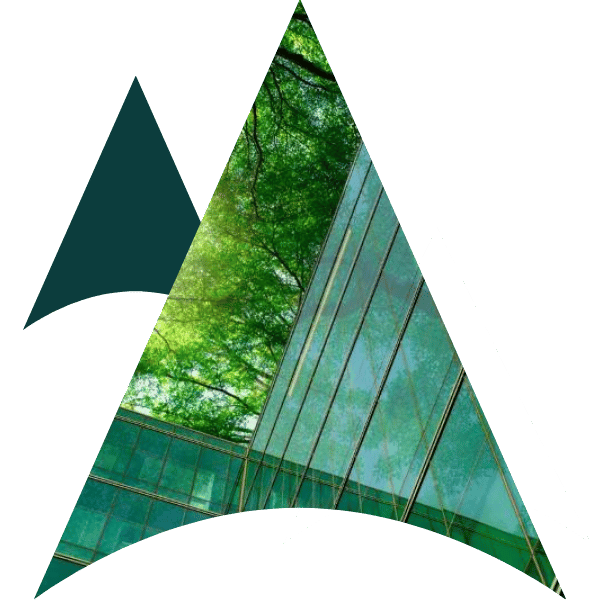 Hero section showing a glass building against green trees