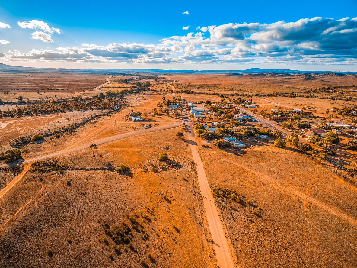 Aerial-view-of-a-small-town-in-vast-plains-of-South-Australian-outback-1013570930_1185x888.jpeg