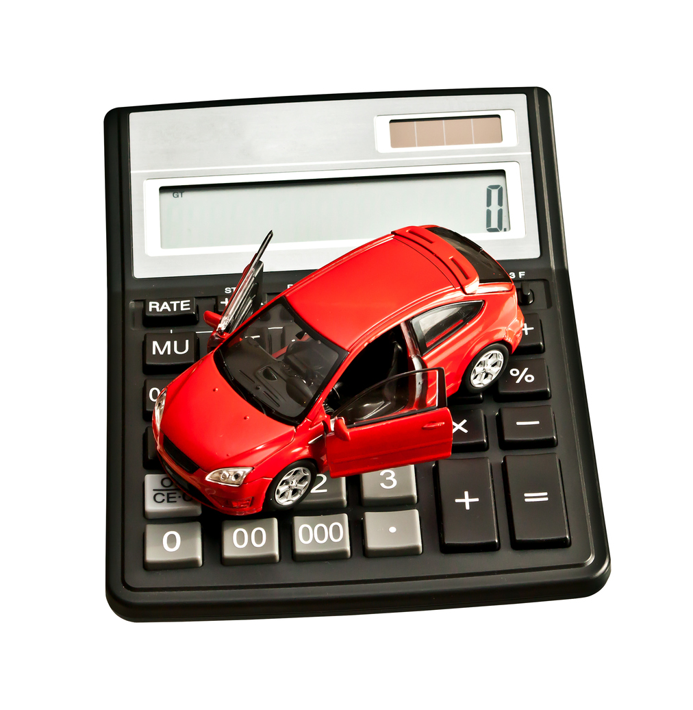 Red-car-on-top-of-calculator-on-white-background-179111920_1013x1037.jpeg