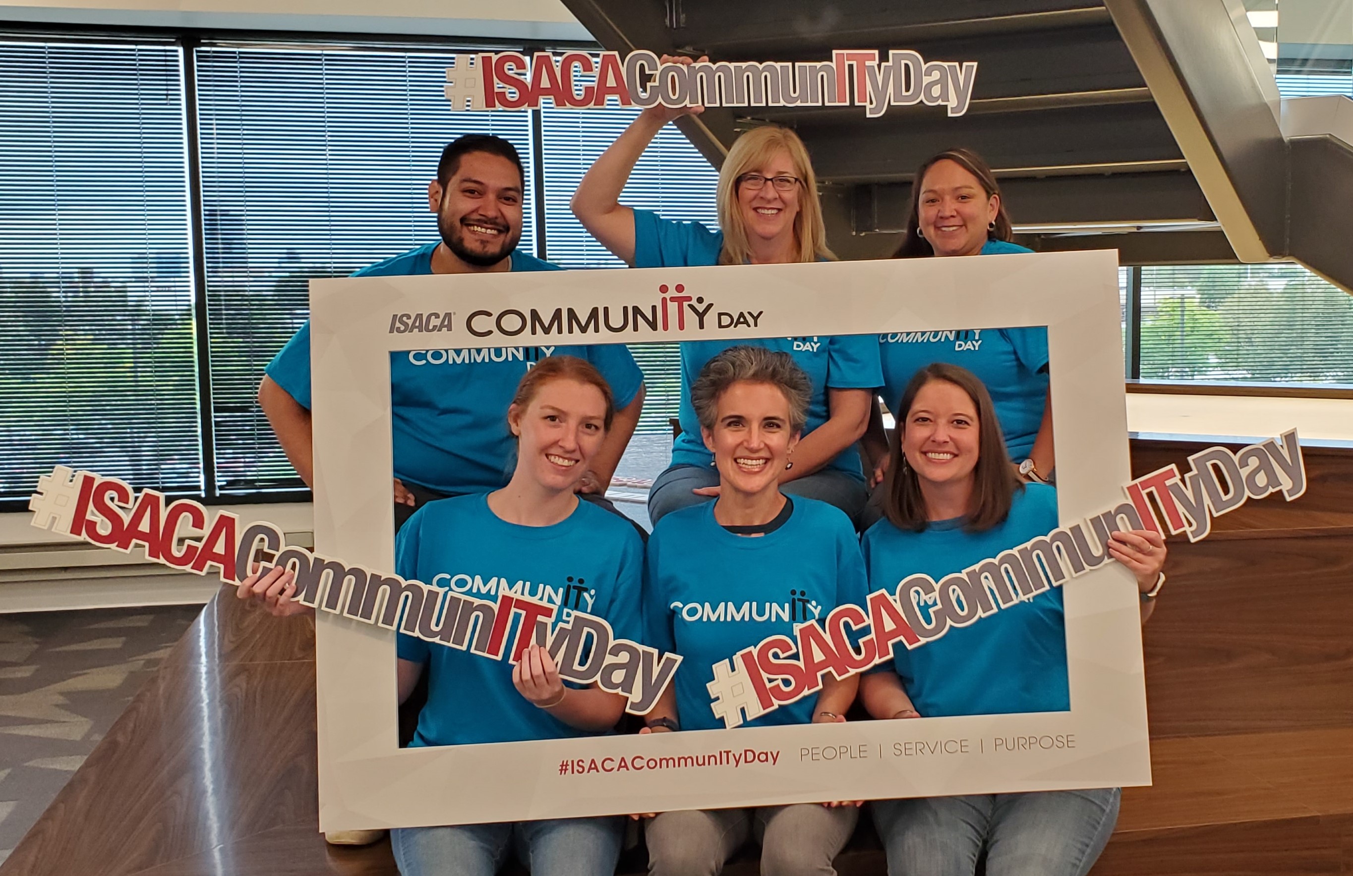 ISACA CommunITy Day group photo with frame, tshirts, and hashtags ISACA CommunITy Day group photo with frame, tshirts, and hashtags