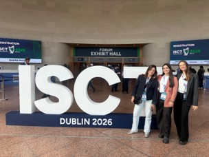 From left to right, Júlia, Ana and Laura in front of the ISCT 2026 Dublin Sign at the Convention Centre Dublin