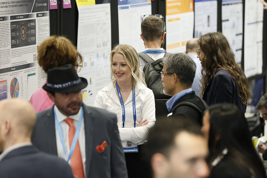 Delegates networking at posters