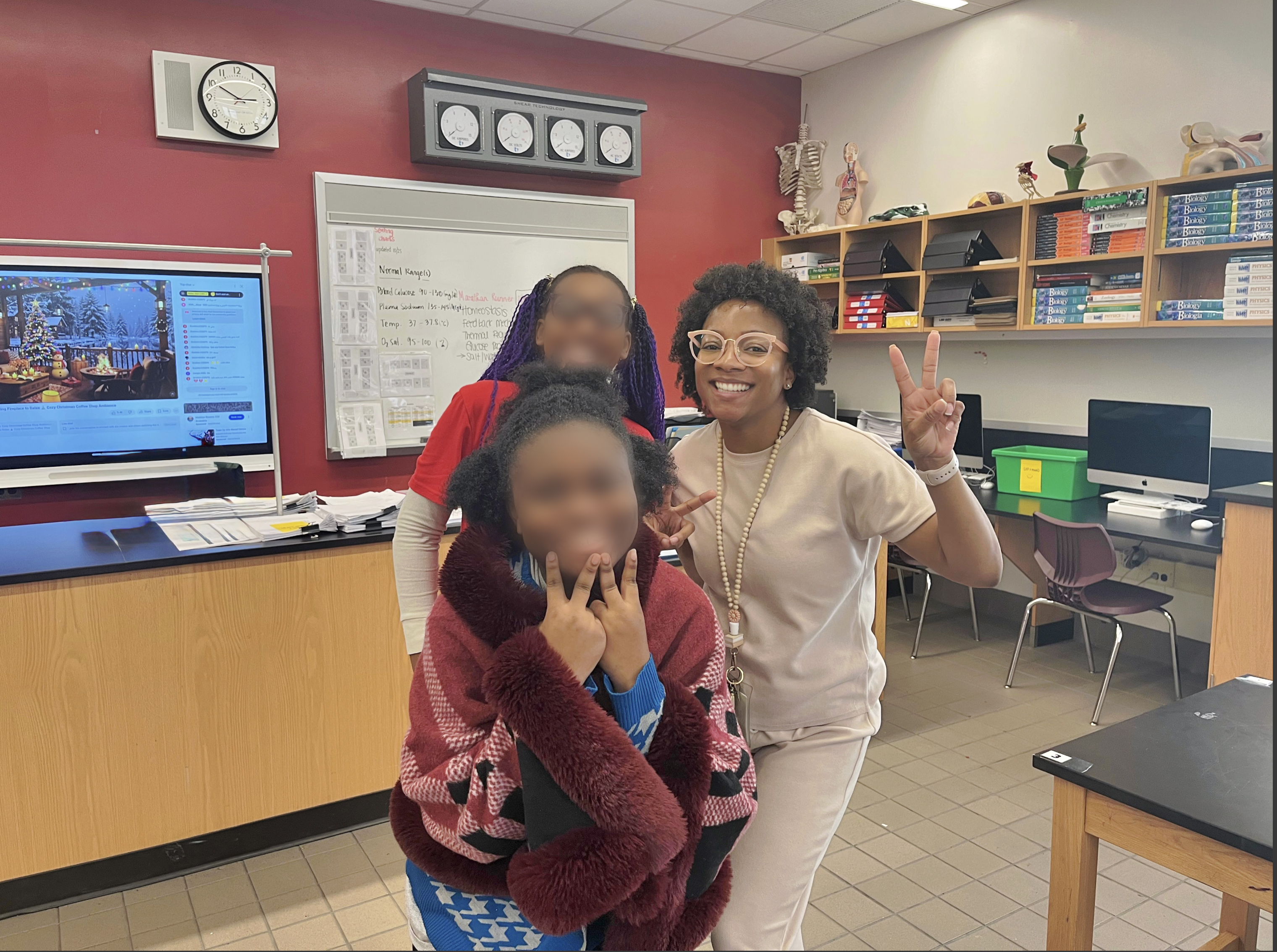 Educator working with students
