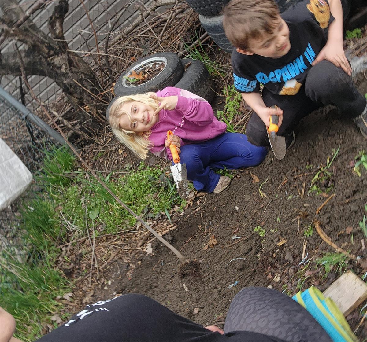 We planted paw paw trees together today ❤️  you Don't see my other 2 babys but it was a family affair