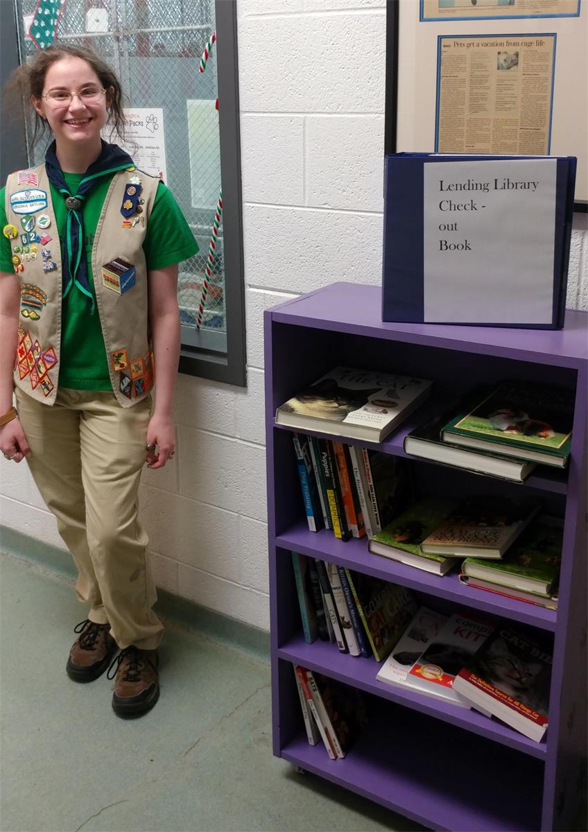 girl scout and lending library