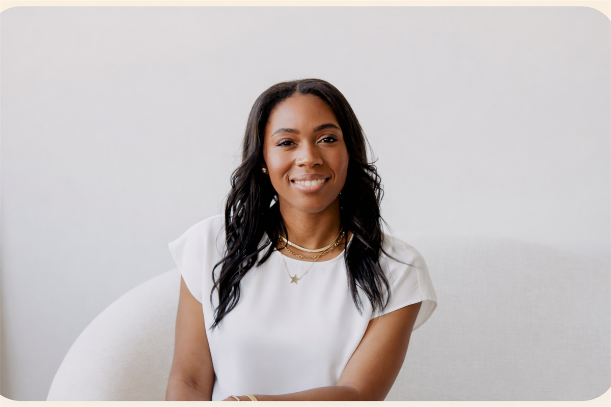 Audris Campbell seated in a white chair