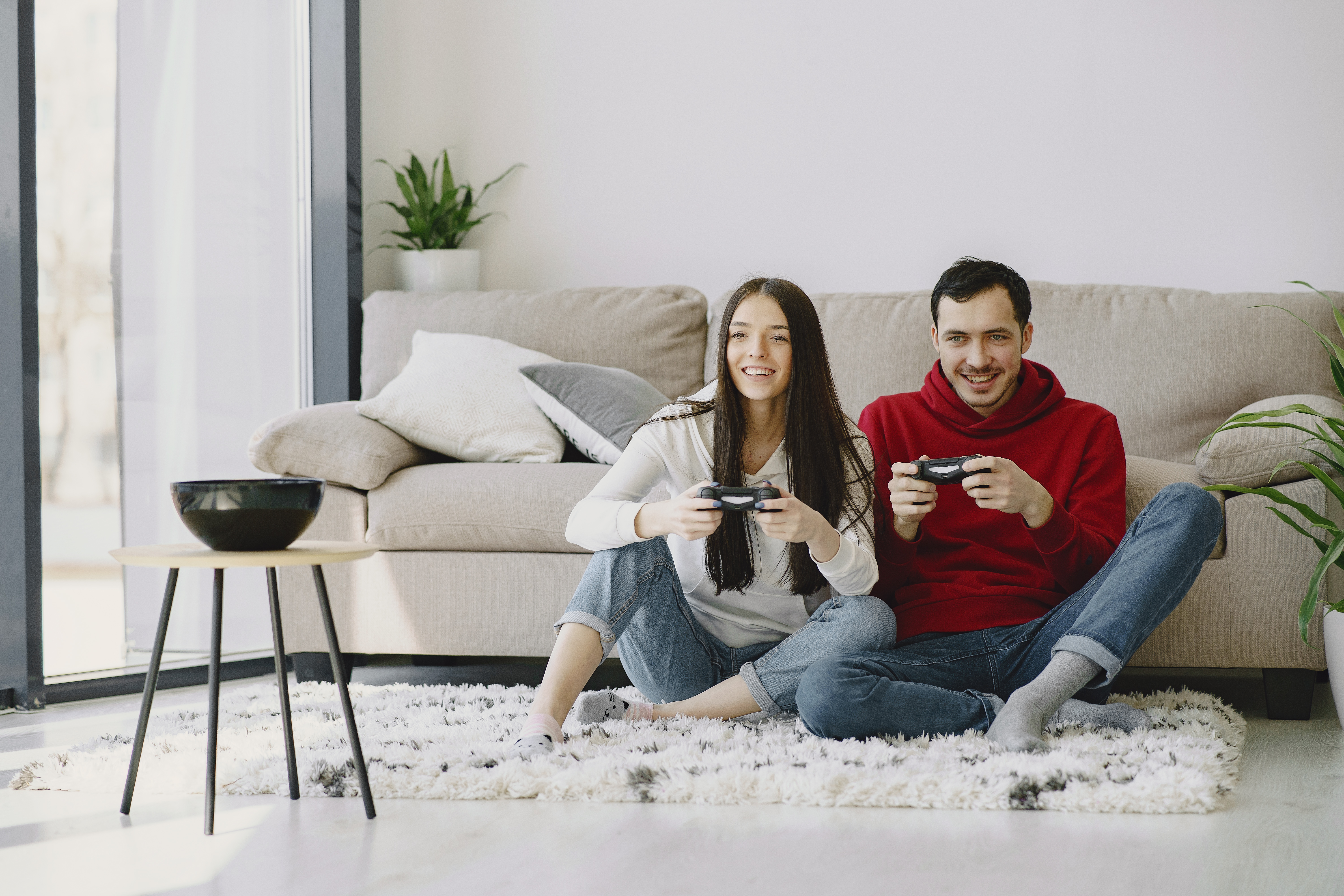 photo of young couple in living room
