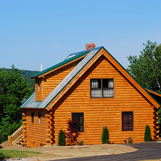 photo of a cabin on a lake