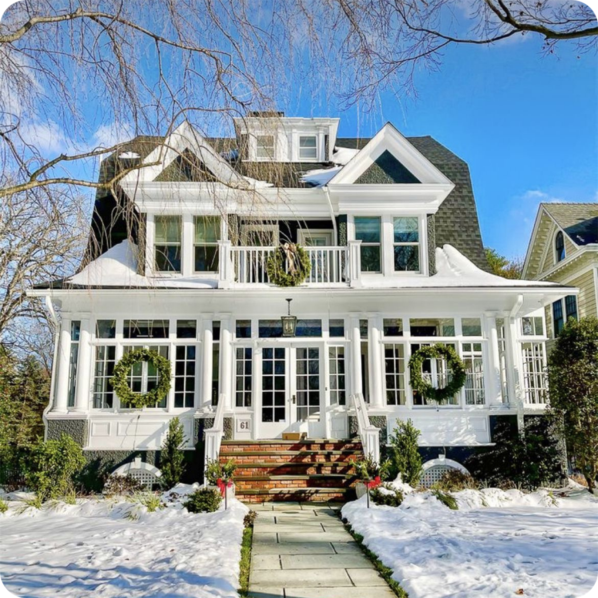 a beautiful house in full sinlight showcases the power of winter curb appeal