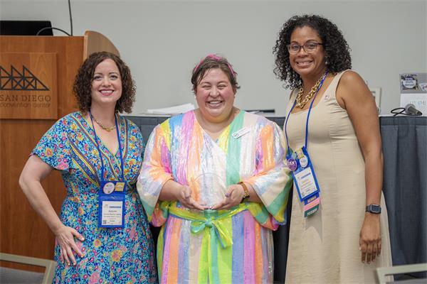 Image of 2025 LvK Award Winner Katie Wiggins-Gawlik with Co-Chairs of NAFSA EAKC 
