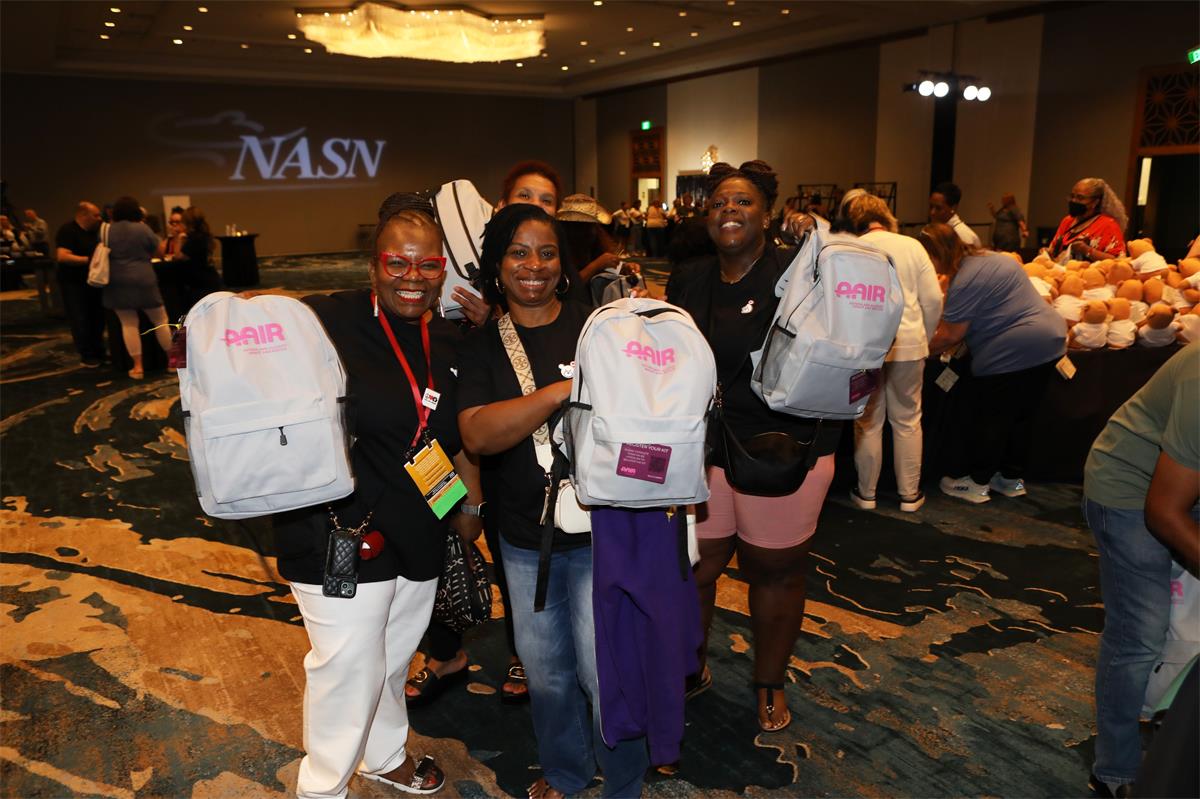 NASN2025 attendees showing backpacks packed during AAIR service project 