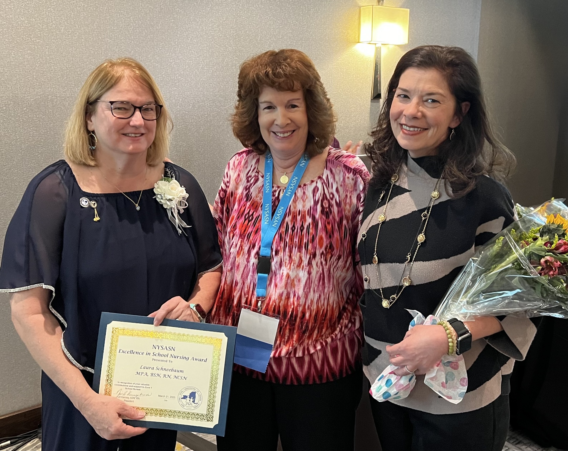 Excellence in School Nursing Winner Laura Schneebaum with Zone 1 Rep Hildi Dzigas and President Jill Kenney