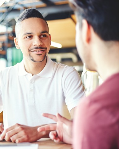 Another mentor and mentee in conversation