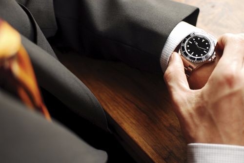 Man looking at watch