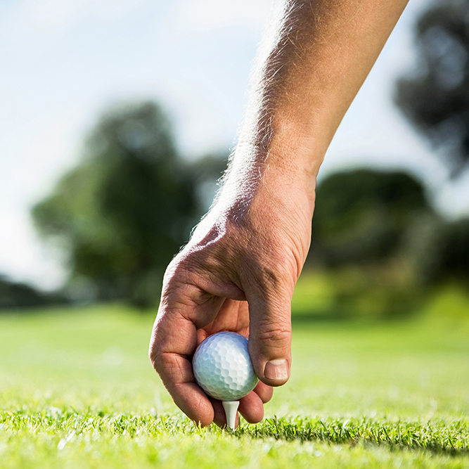advocacy-golf-usa-tee-time-coalition-hand-placing-golf-ball-on-tee.jpg