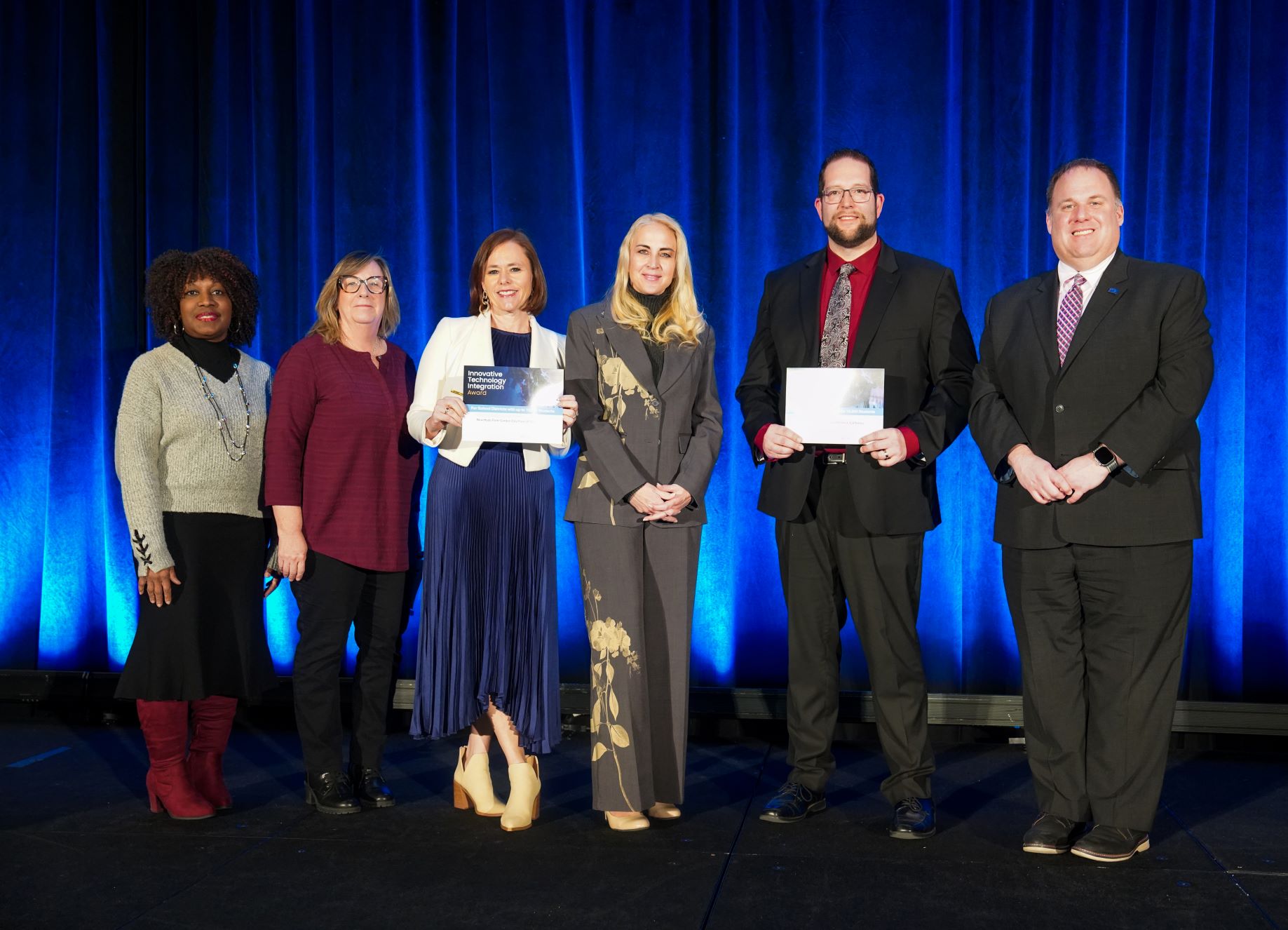 Representatives from New Hyde Park–Garden City Union Free School District (NY) and Columbia Union School District (CA) with NSBA Executive Director Verjeana McCotter-Jacobs and NSBA President Devin Sheehan